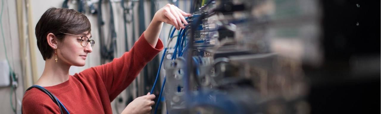 Student working in a server room